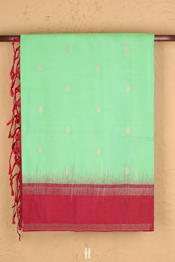 Soft Silk Saree In Pale Green With Floral Buttas