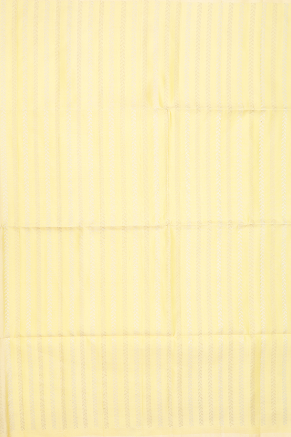 Soft Silk Saree In Pastel Yellow With Stripes Design