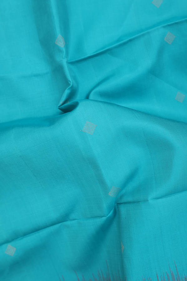 Soft Silk Saree In Peacock Blue With Diamond Buttas