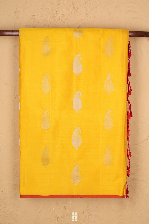 Soft Silk Saree In Yellow With Paisley Motifs