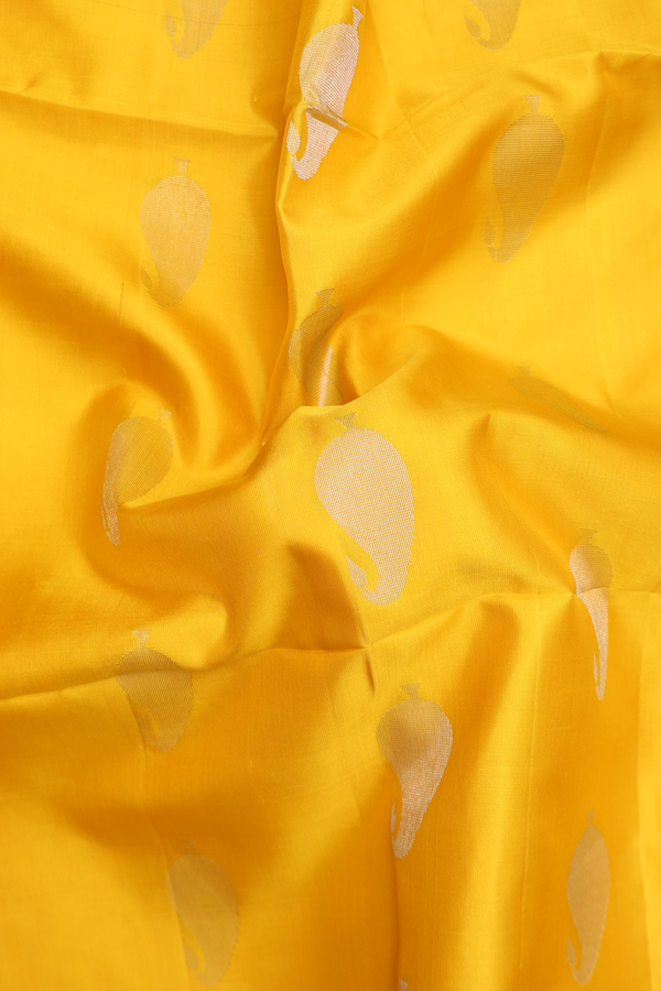 Soft Silk Saree In Yellow With Paisley Motifs