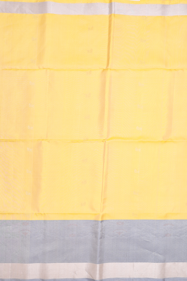 Soft Silk Saree In Yellow With Zari Buttas