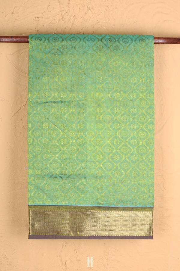 Traditional Silk Cotton Saree In Green With Scallop Design