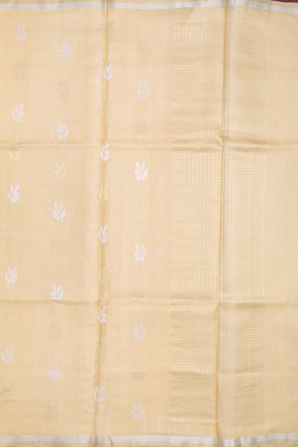 Tussar Silk Saree In Pastel Yellow With Leaf Buttas