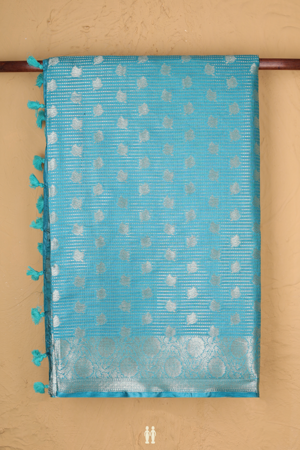 Tussar Silk Saree In Turkish Blue With Floral Buttas