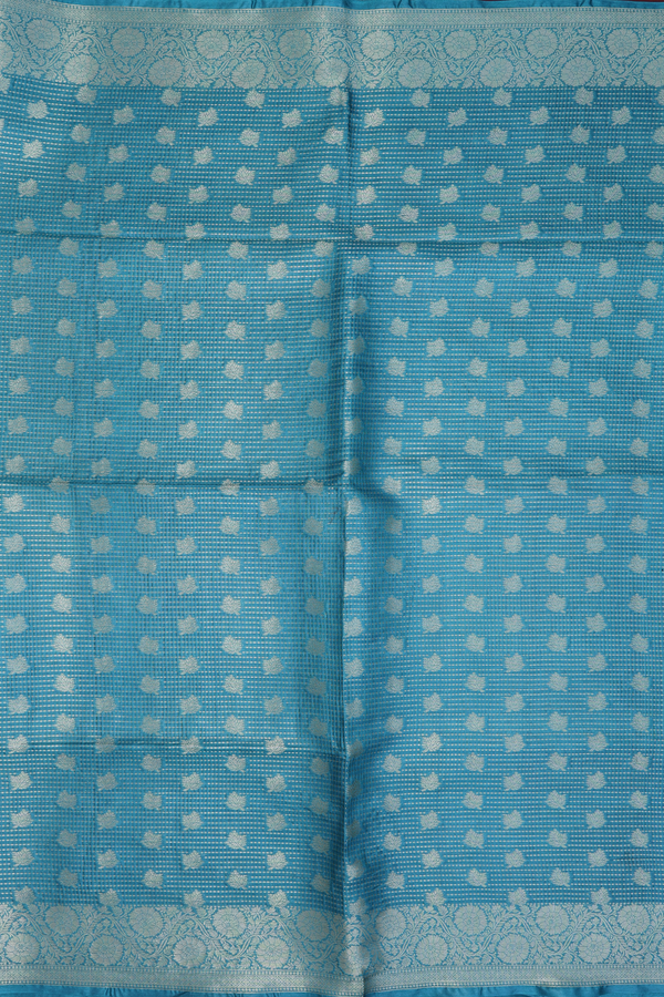 Tussar Silk Saree In Turkish Blue With Floral Buttas