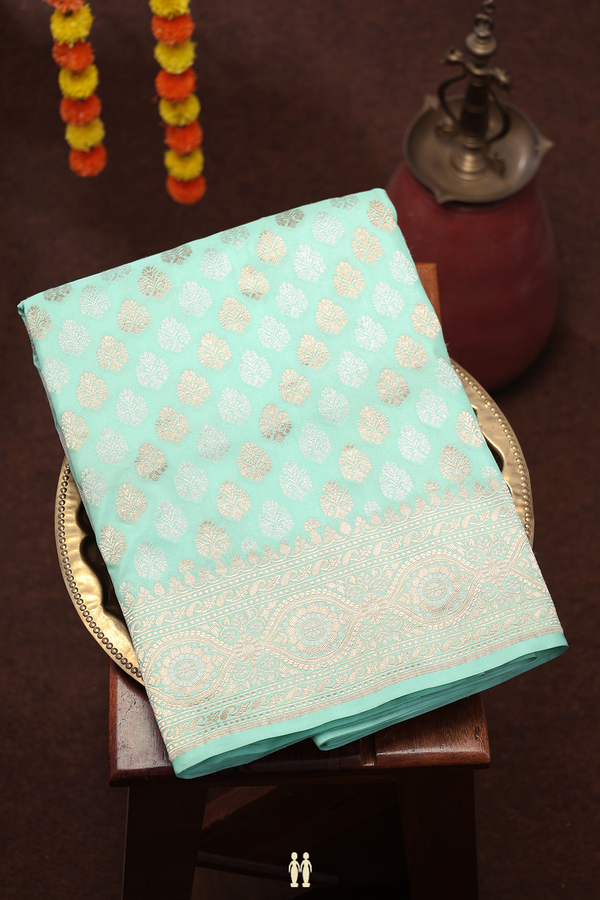 Banarasi Silk Saree In Green With Floral Buttas