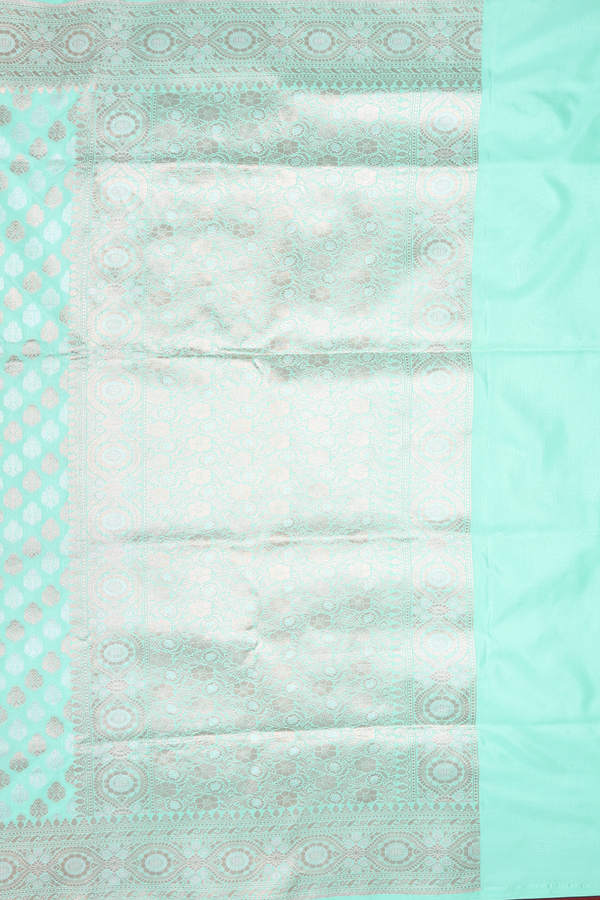 Banarasi Silk Saree In Green With Floral Buttas