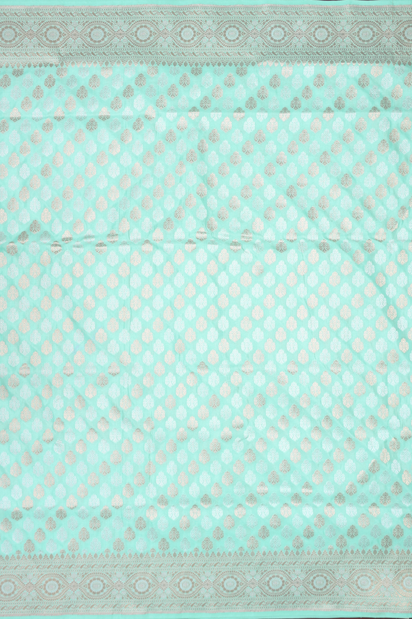 Banarasi Silk Saree In Green With Floral Buttas