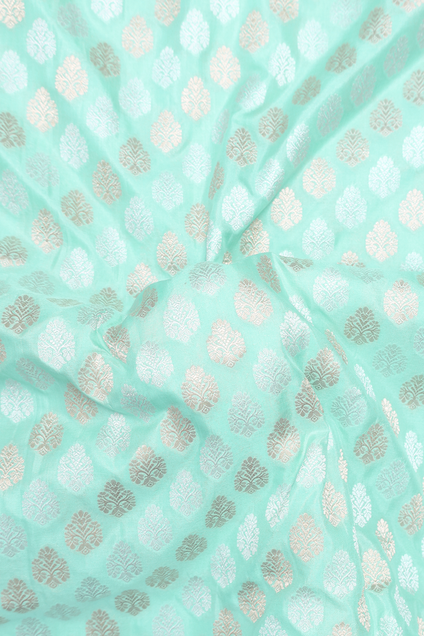 Banarasi Silk Saree In Green With Floral Buttas