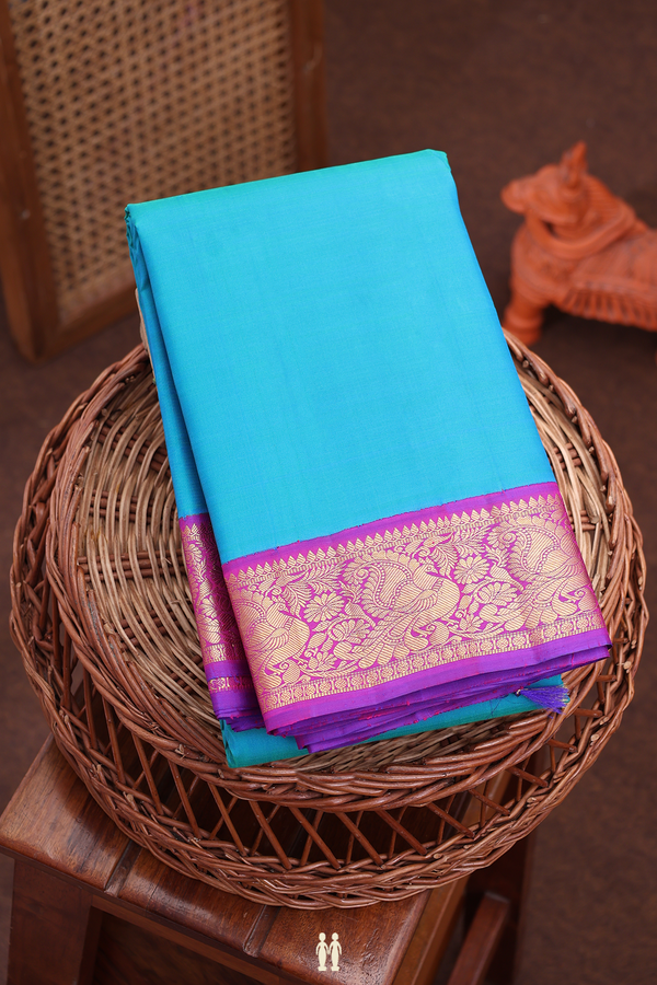 Kanchipuram Silk Saree In Peacock Blue With Korvai Border
