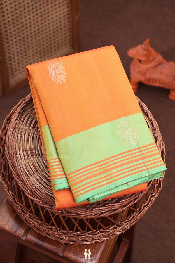 Kanchipuram Silk Saree In Orange With Zari Buttas