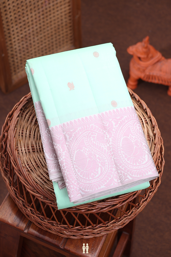 Kanchipuram Silk Saree In Pastel Green With Peacock Buttas