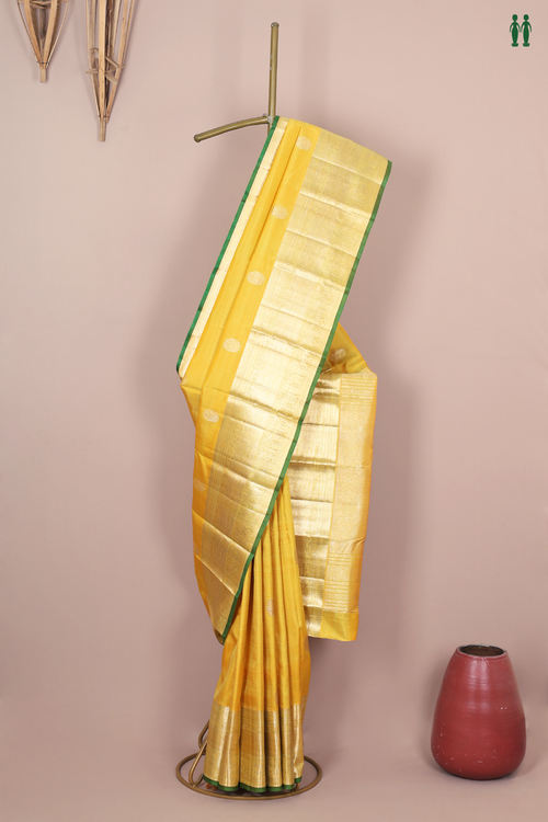 Kanchipuram Silk Saree In Yellow With Peacock Buttas
