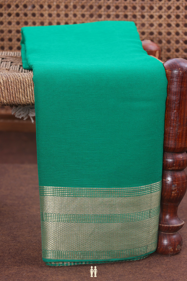 Chiffon Saree In Plain Emerald Green With Zari Border