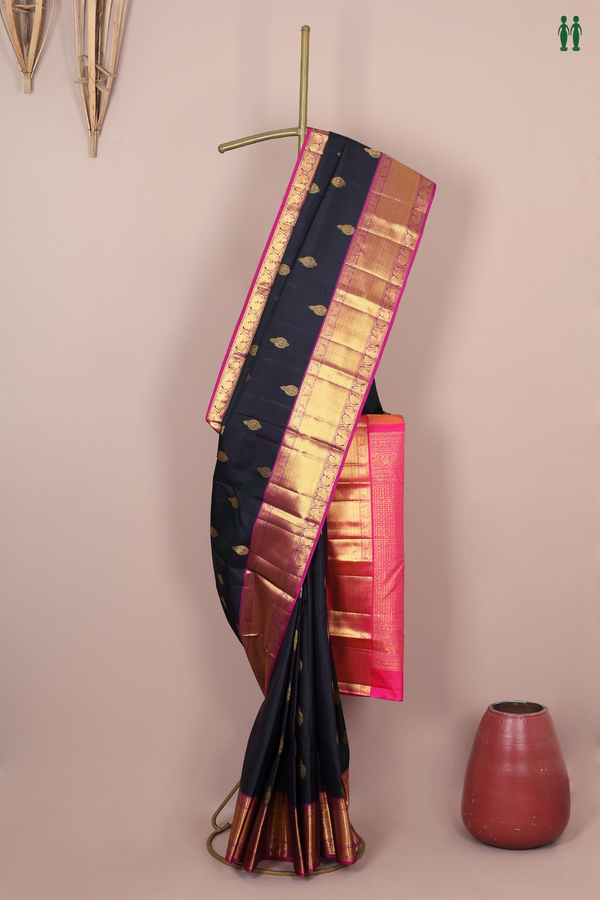 Kanchipuram Silk Saree In Bottle Green With Zari Buttas