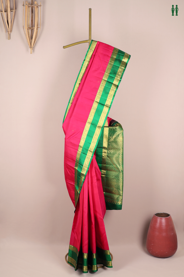 Kanchipuram Silk Saree In Rani Pink With Floral Buttas