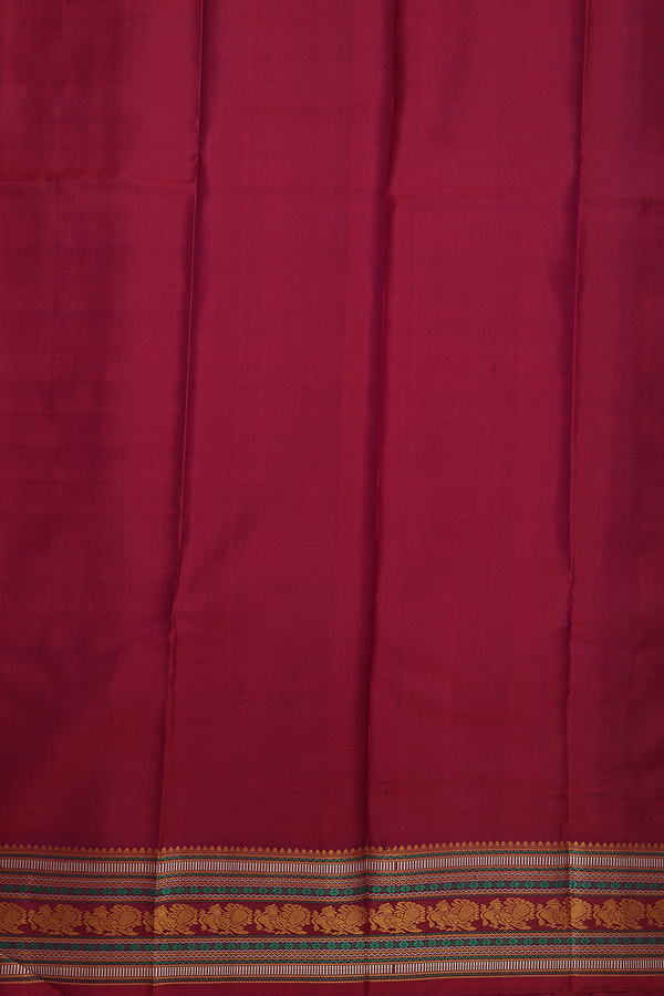 Kanchipuram Silk Saree In Blush Orange With Peacock Buttas