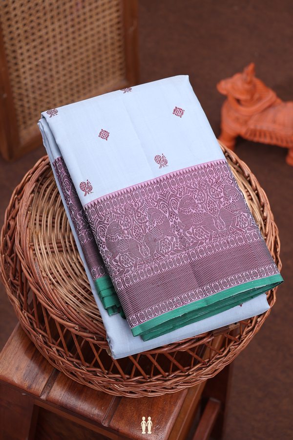 Kanchipuram Silk Saree In Steel Blue With Peacock Buttas