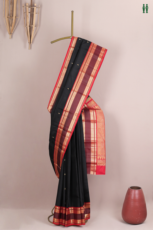 Kanchipuram Silk Saree In Black With Zari Buttas
