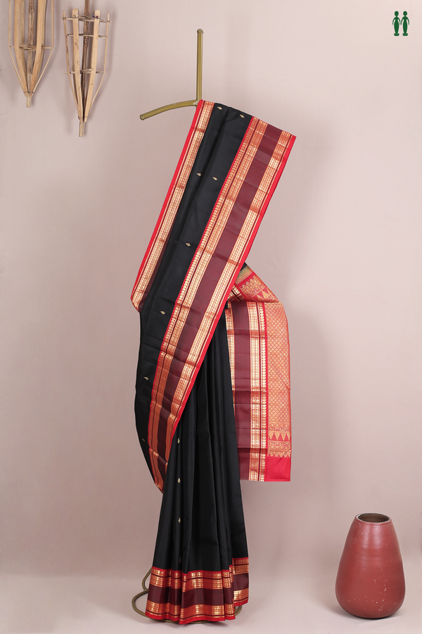 Kanchipuram Silk Saree In Black With Zari Buttas