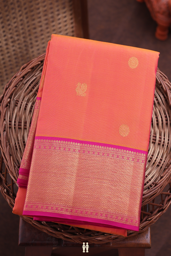 Kanchipuram Silk Saree In Coral Orange With Peacock Buttas