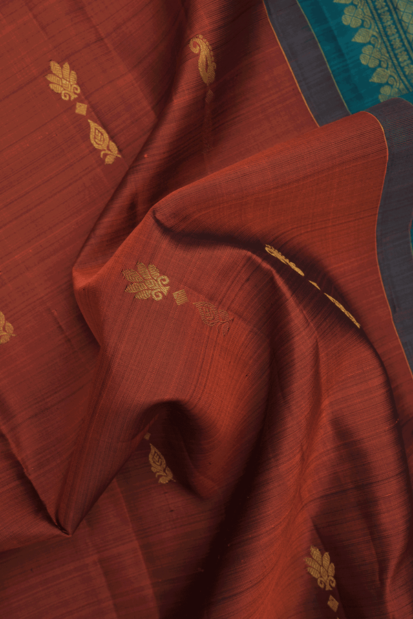 Floral And Paisley Motifs Rust Orange Kanchipuram Silk Saree