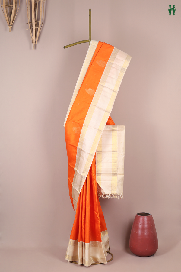 Kanchipuram Silk Saree In Orange With Floral Buttas