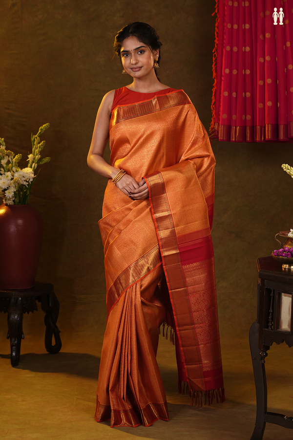 Kanchipuram Silk Saree In Orange Along Checks With Buttas