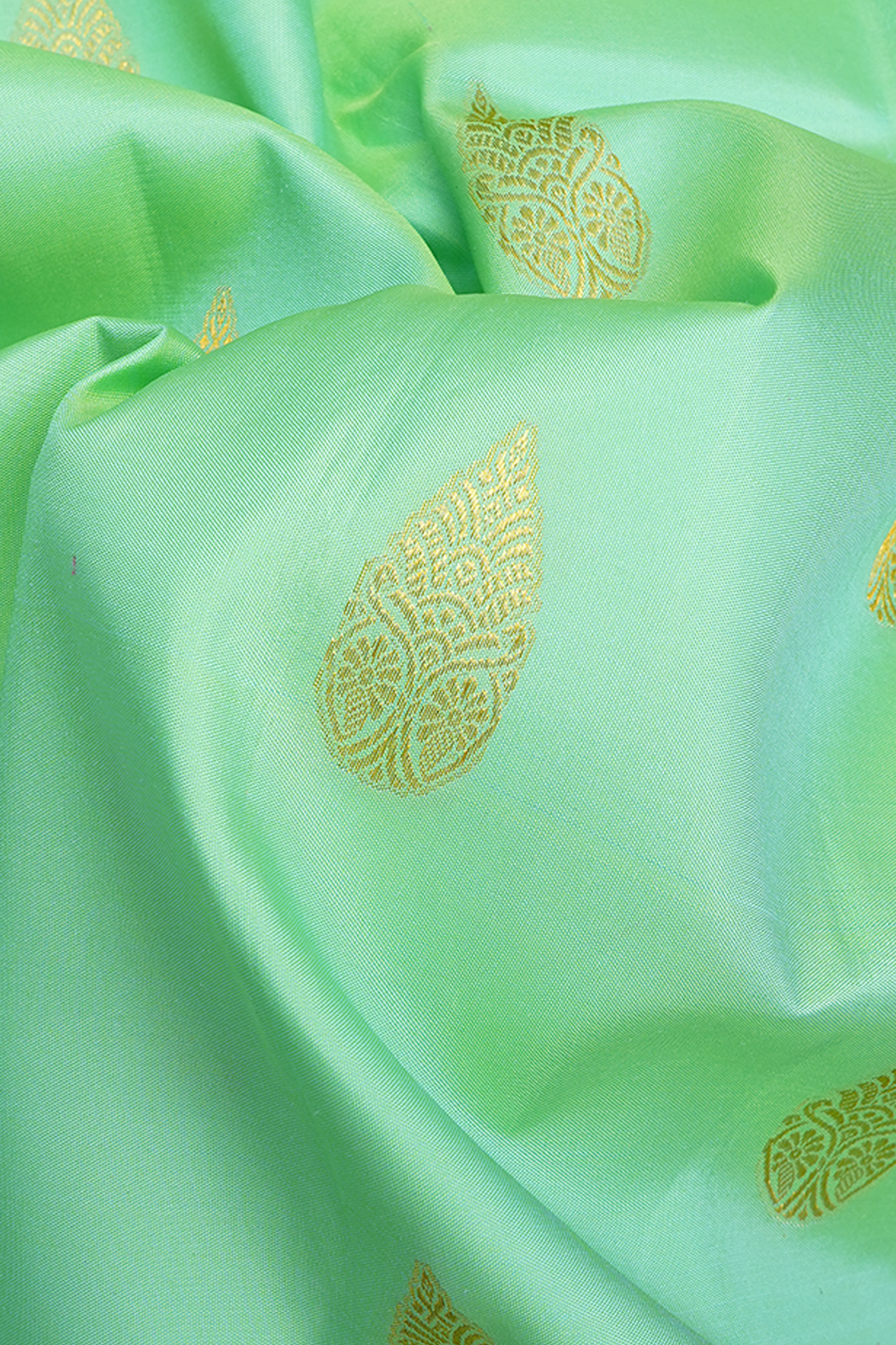 Thilagam Buttas Pastel Green Kanchipuram Silk Saree