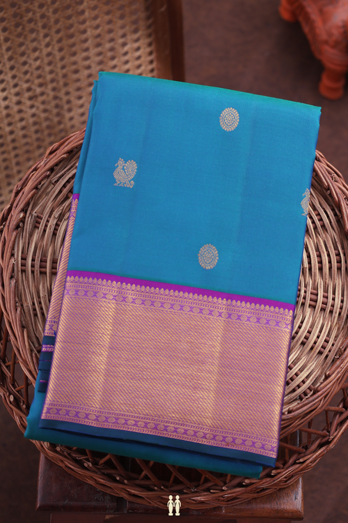 Kanchipuram Silk Saree In Peacock Blue With Peacock Buttas