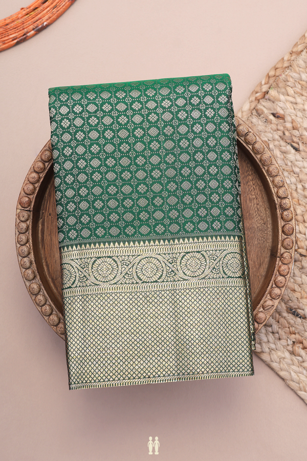 Kanchipuram Silk Saree In Dark Green Along Checks With Buttas