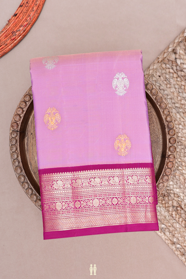 Kanchipuram Silk Saree In Purple With Irruthalai Pakshi Buttas
