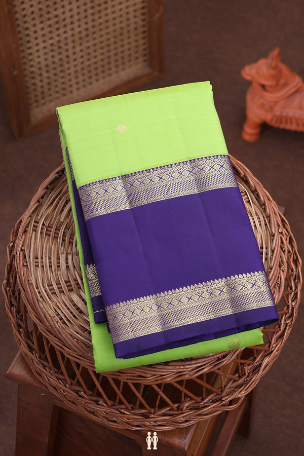Kanchipuram Silk Saree In Parrot Green With Peacock Buttas