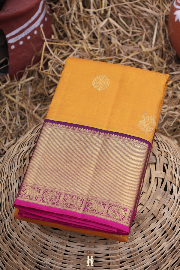 Kanchipuram Silk Saree In Mustard Yellow With Peacock Buttas