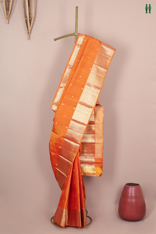 Kanchipuram Silk Saree In Orange With Peacock Buttas
