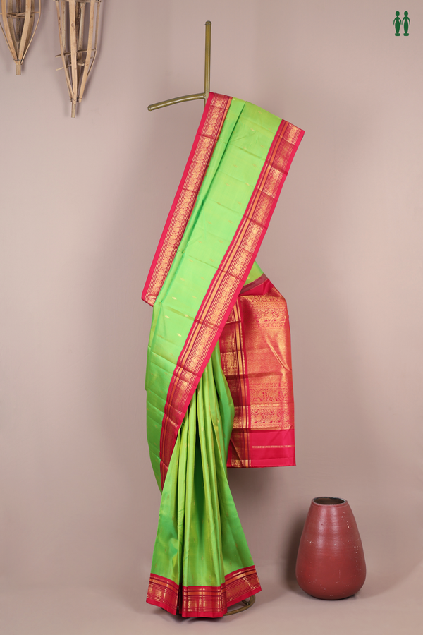 Kanchipuram Silk Saree In Parrot Green With Zari Buttas
