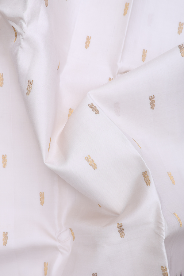 Kanchipuram Silk Saree In White With Floral Buttas