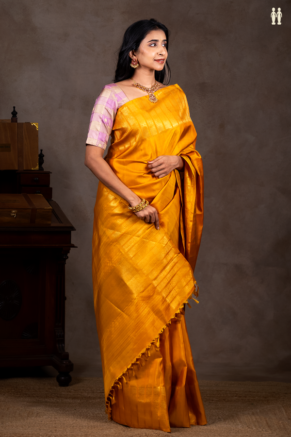 Kanchipuram Silk Saree In Plain Yellow With Zari Border