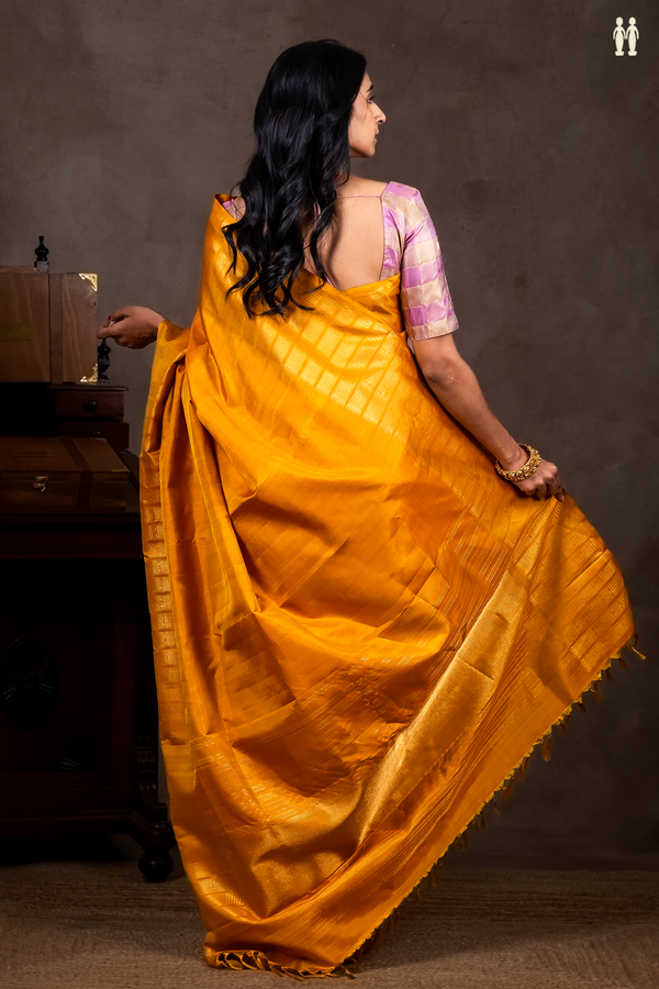 Kanchipuram Silk Saree In Plain Yellow With Zari Border