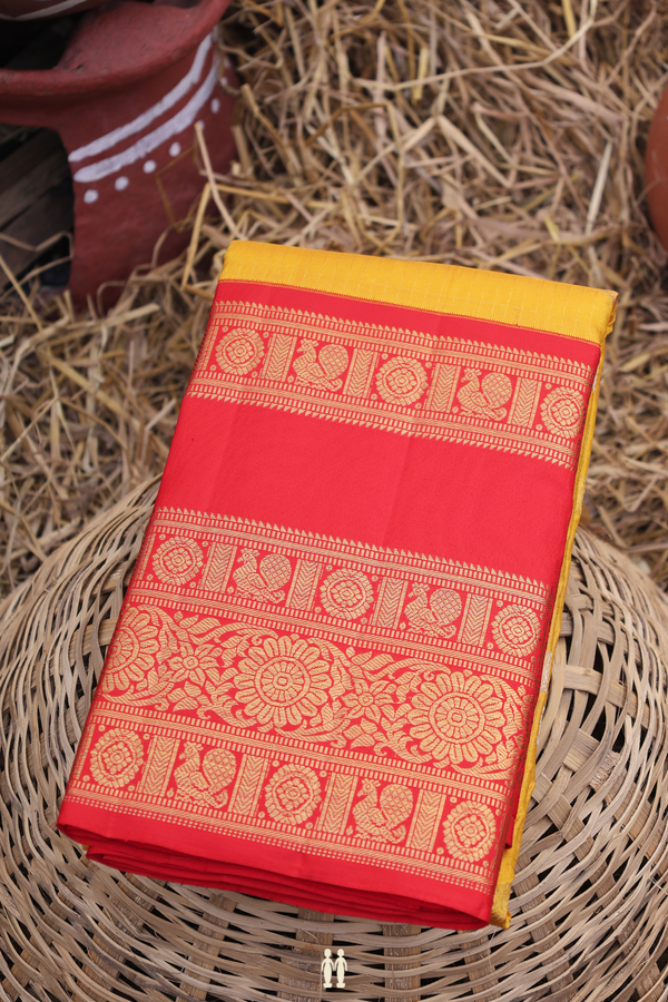 Kanchipuram Silk Saree In Yellow Along Checks With Buttas