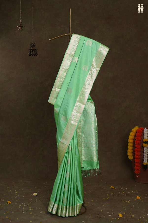 Floral Zari Buttas Pastel Green Soft Silk Saree