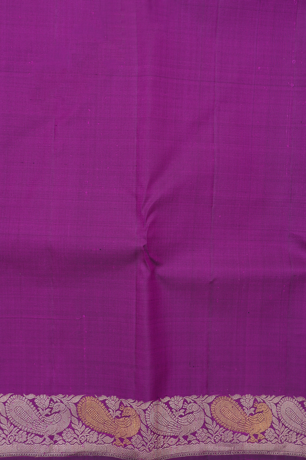 Kanchipuram Silk Saree In Purple With Floral Buttas