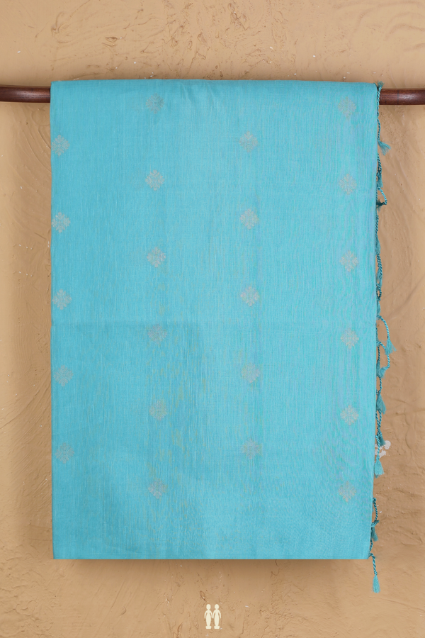 Linen Saree In Sky Blue With Floral Buttas
