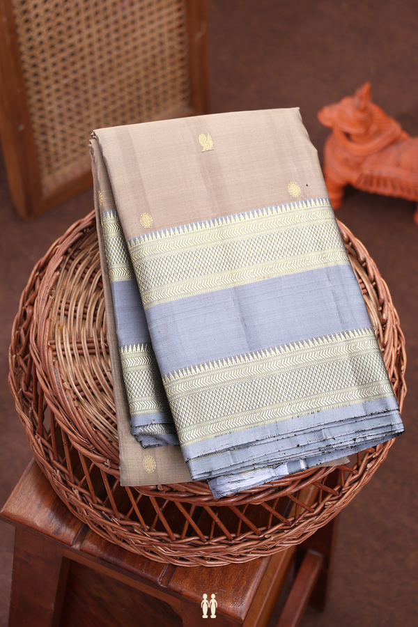Kanchipuram Silk Saree In Brown With Peacock Buttas