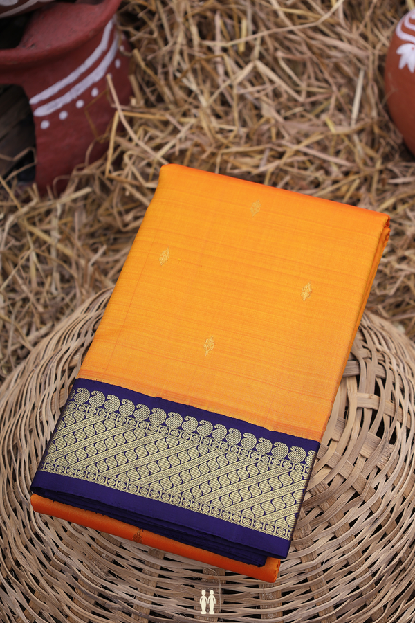 Kanchipuram Silk Saree In Royal Orange With Floral Buttis