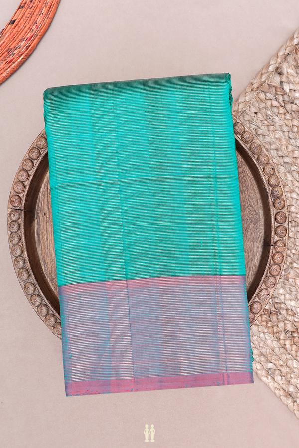 Kanchipuram Silk Saree In Peacock Green With Stripes Design