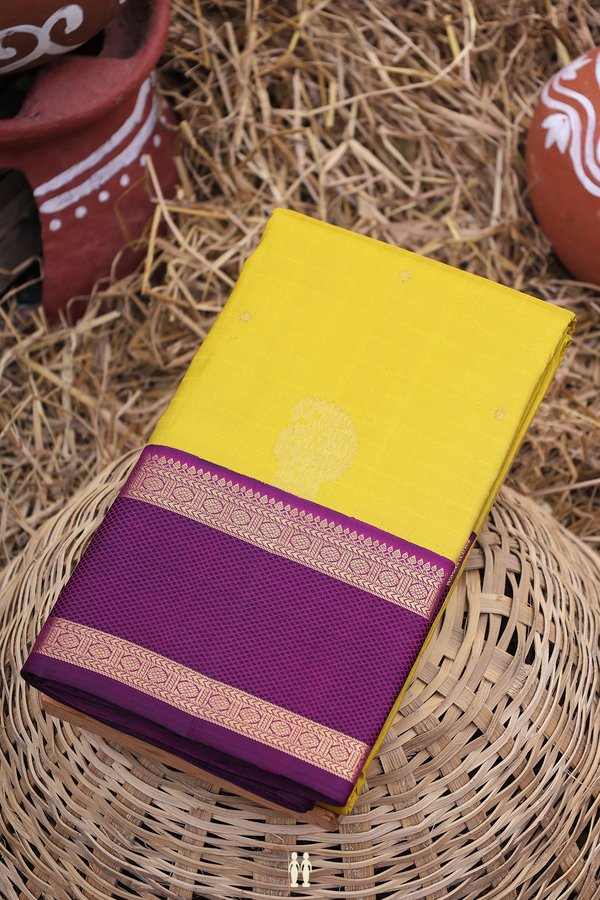 Kanchipuram Silk Saree In Yellow With Zari Buttas