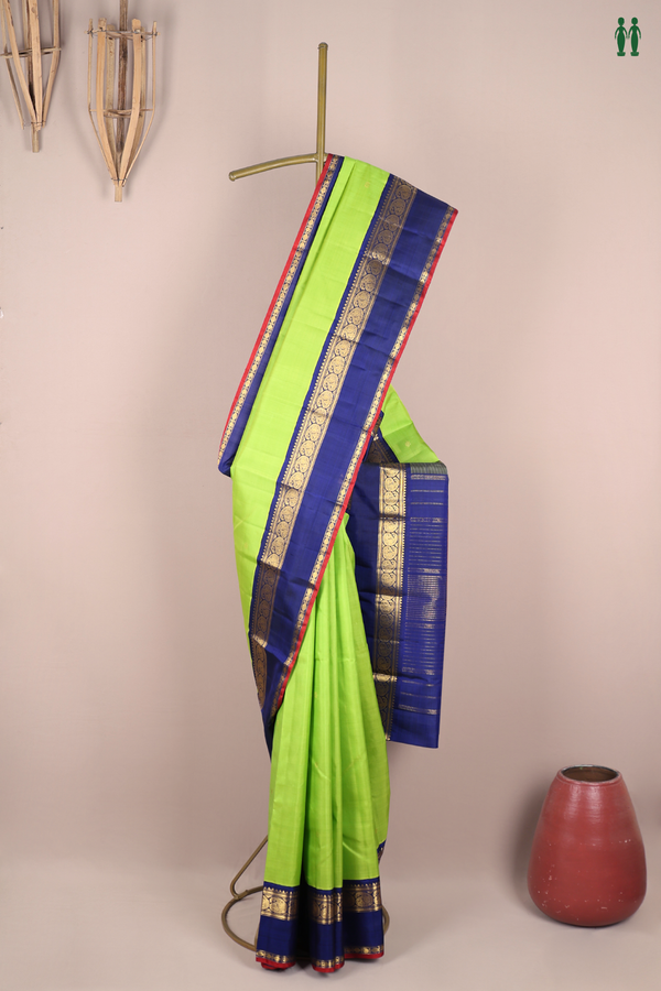 Kanchipuram Silk Saree In Lime Green With Floral Buttas