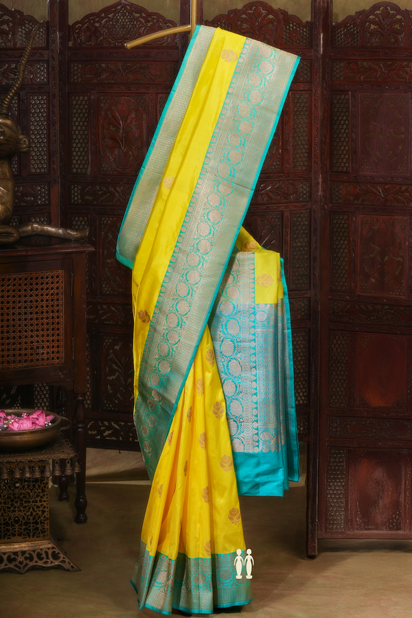 Banarasi Silk Saree In Yellow With Floral Zari Motifs